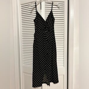 Black dress with white polka dots. Never worn.
